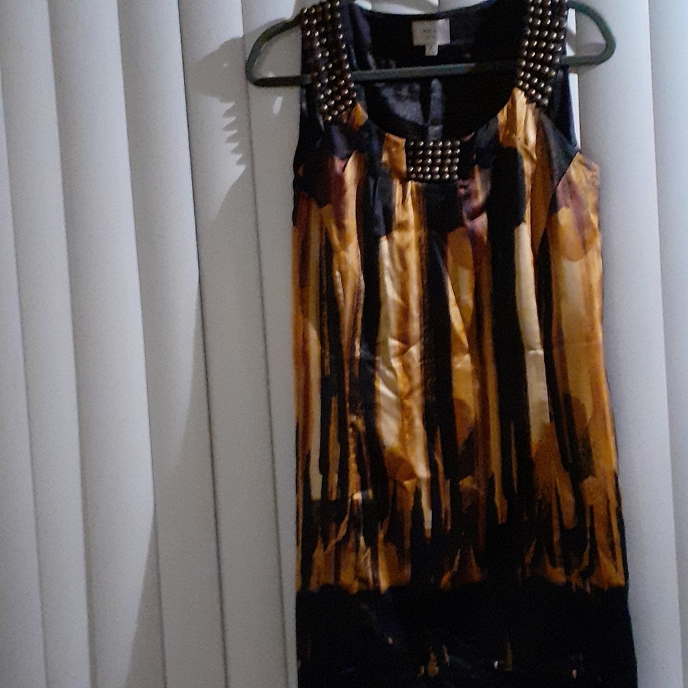 Add heeled sandals; pants/jeans & you are set